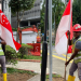 “Just doing my duty, Madam” – Migrant Worker fixes fallen Singapore Flag at Haig Road